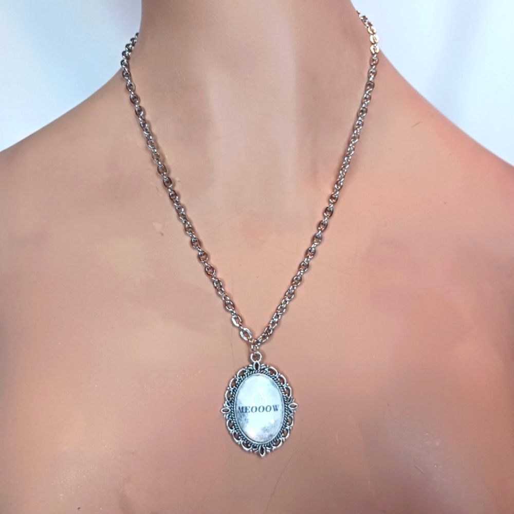 Distresses Manga Speach Bubble Meow Pendant in Silver Frame.